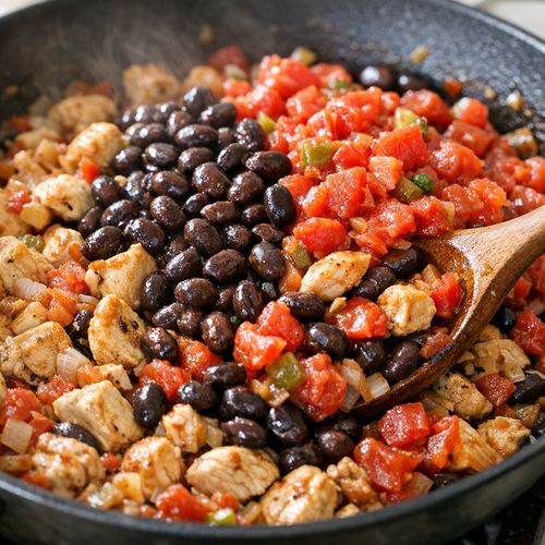 Step 4: Incorporate the Beans and Tomatoes